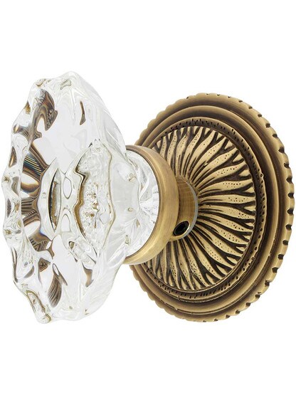 Sunburst Rosette Set With Fluted Oval Crystal Knobs in Antique Brass.